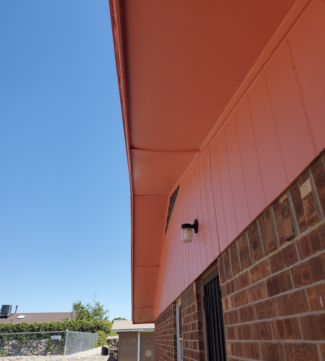 Exterior painting of underneath roof edge